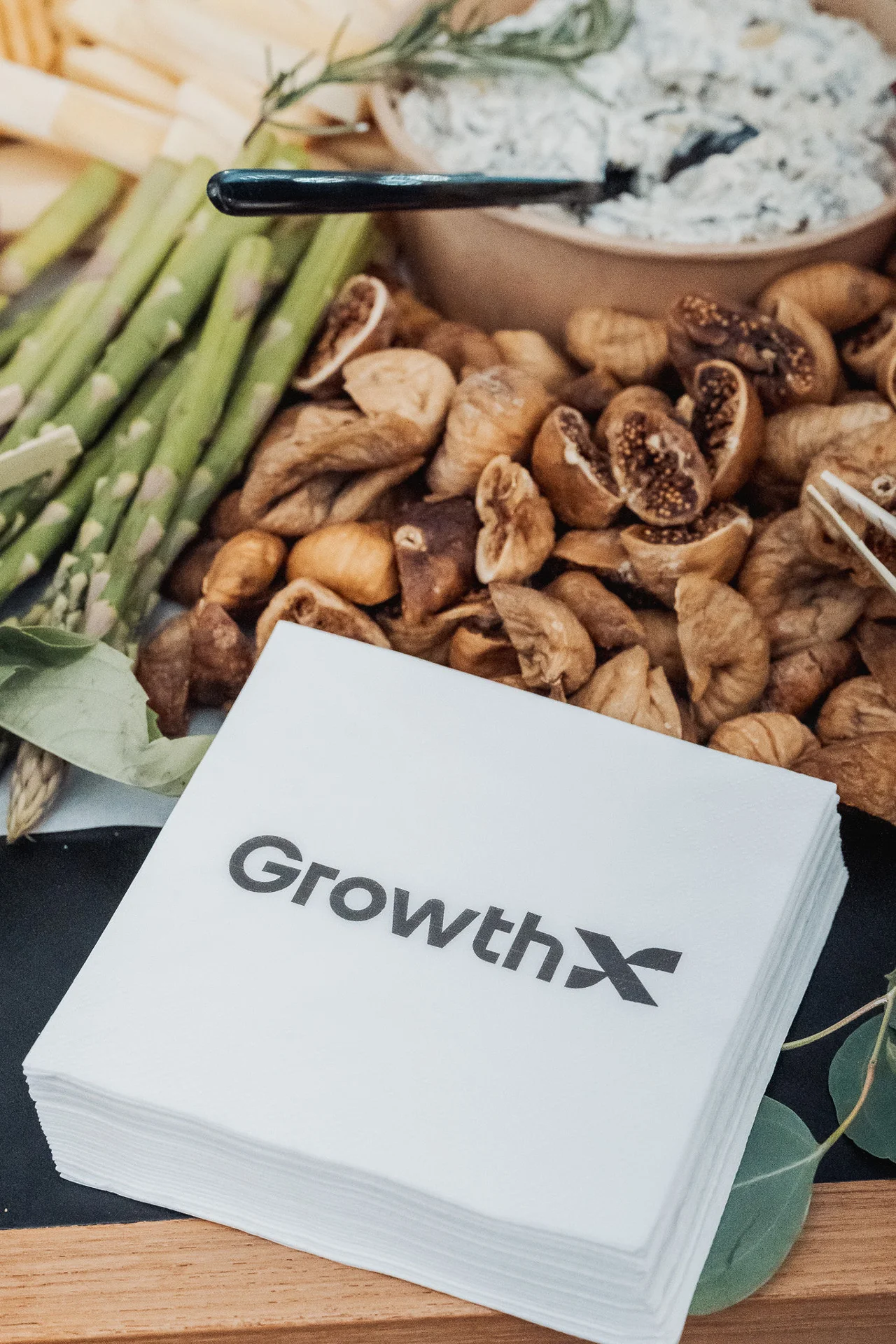 GrowthX branded box on a food display at GrowthX Launch Party