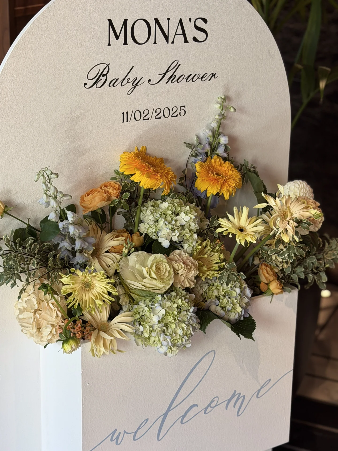 Personalized baby shower sign with flowers at Bloom Baby Shower