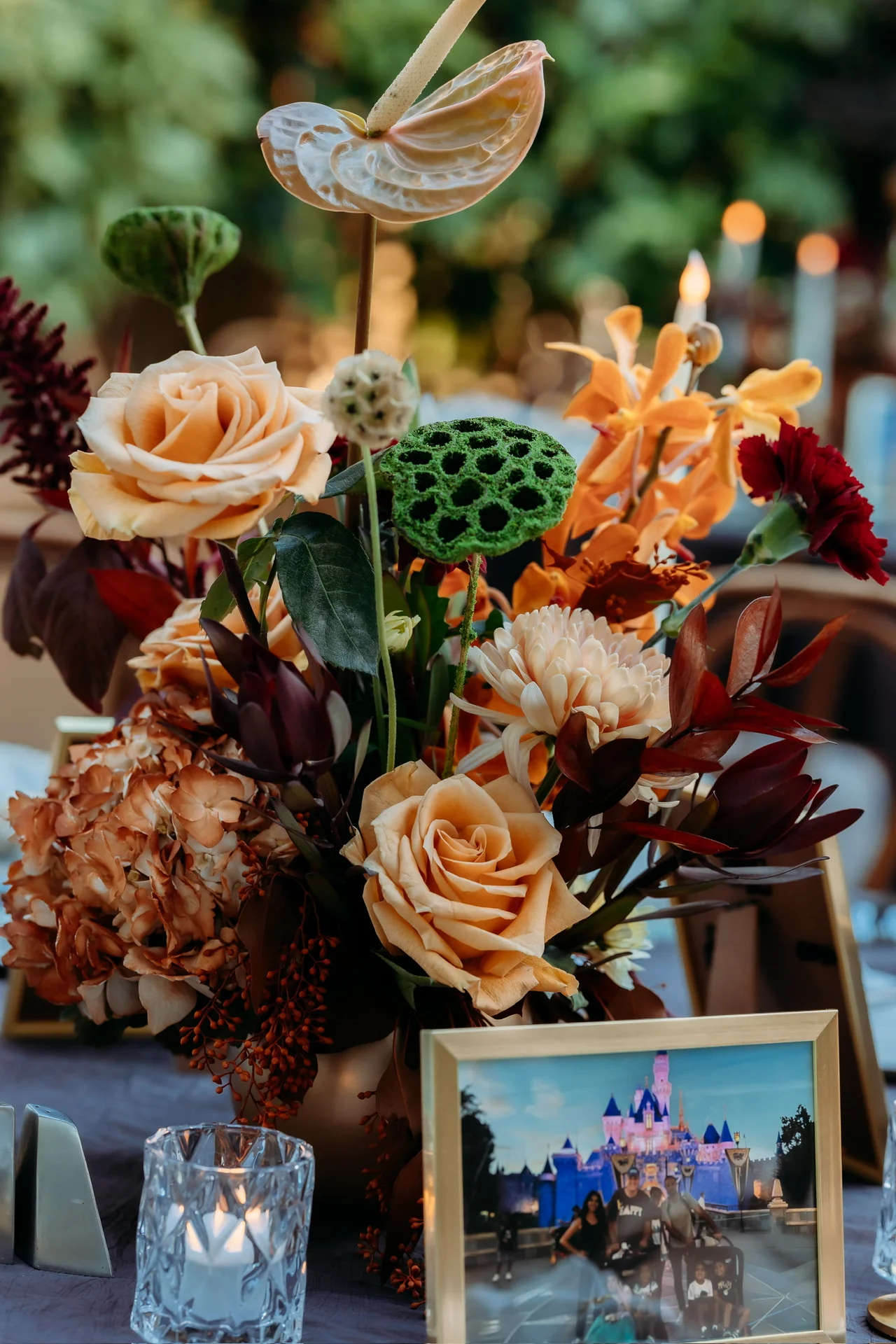 Rich-colored birthday florals and personal photographs at Deena 40th Birthday