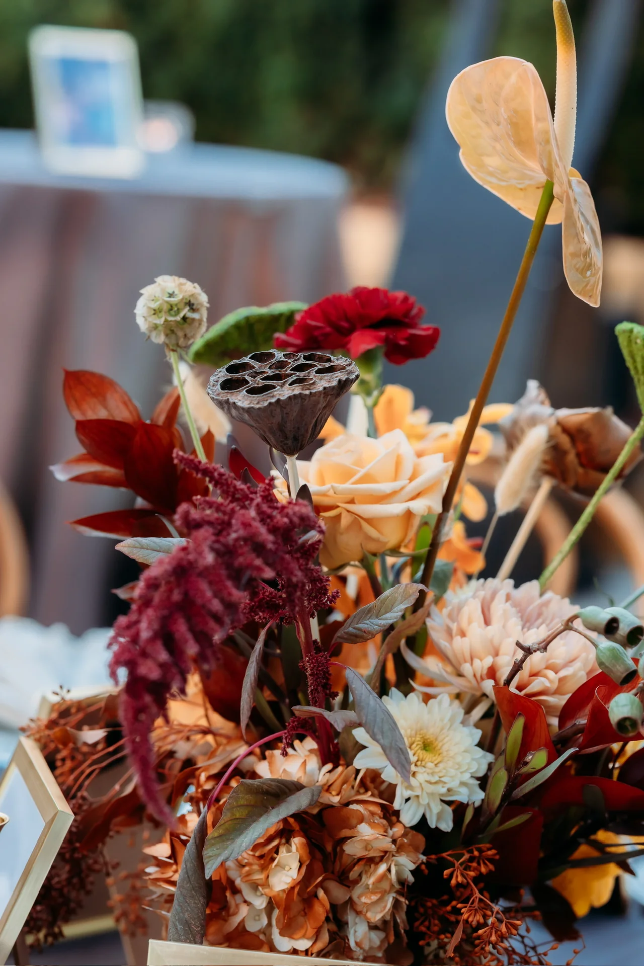 Warm floral arrangement with candles at Deena 40th Birthday