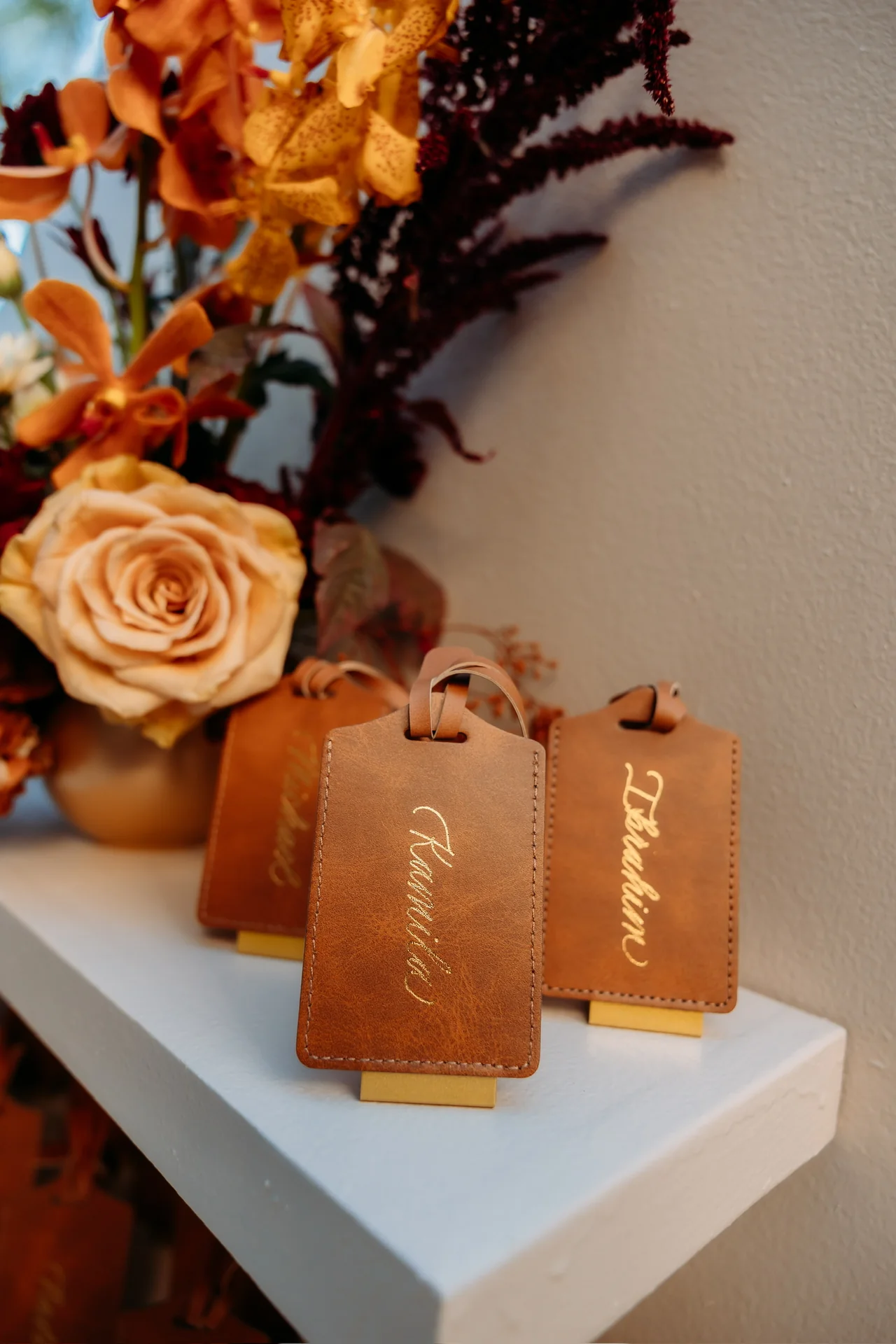 Guest favors beside flowers at Deena 40th Birthday