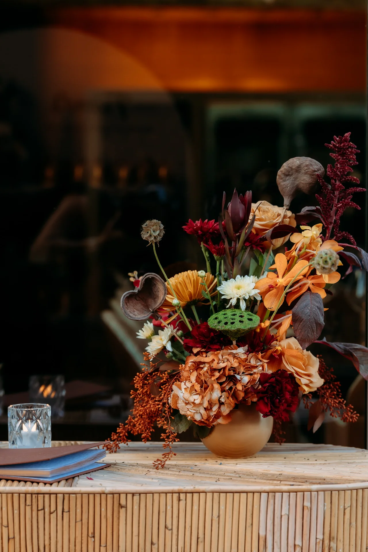 Birthday table with rich-colored flowers at Deena 40th Birthday