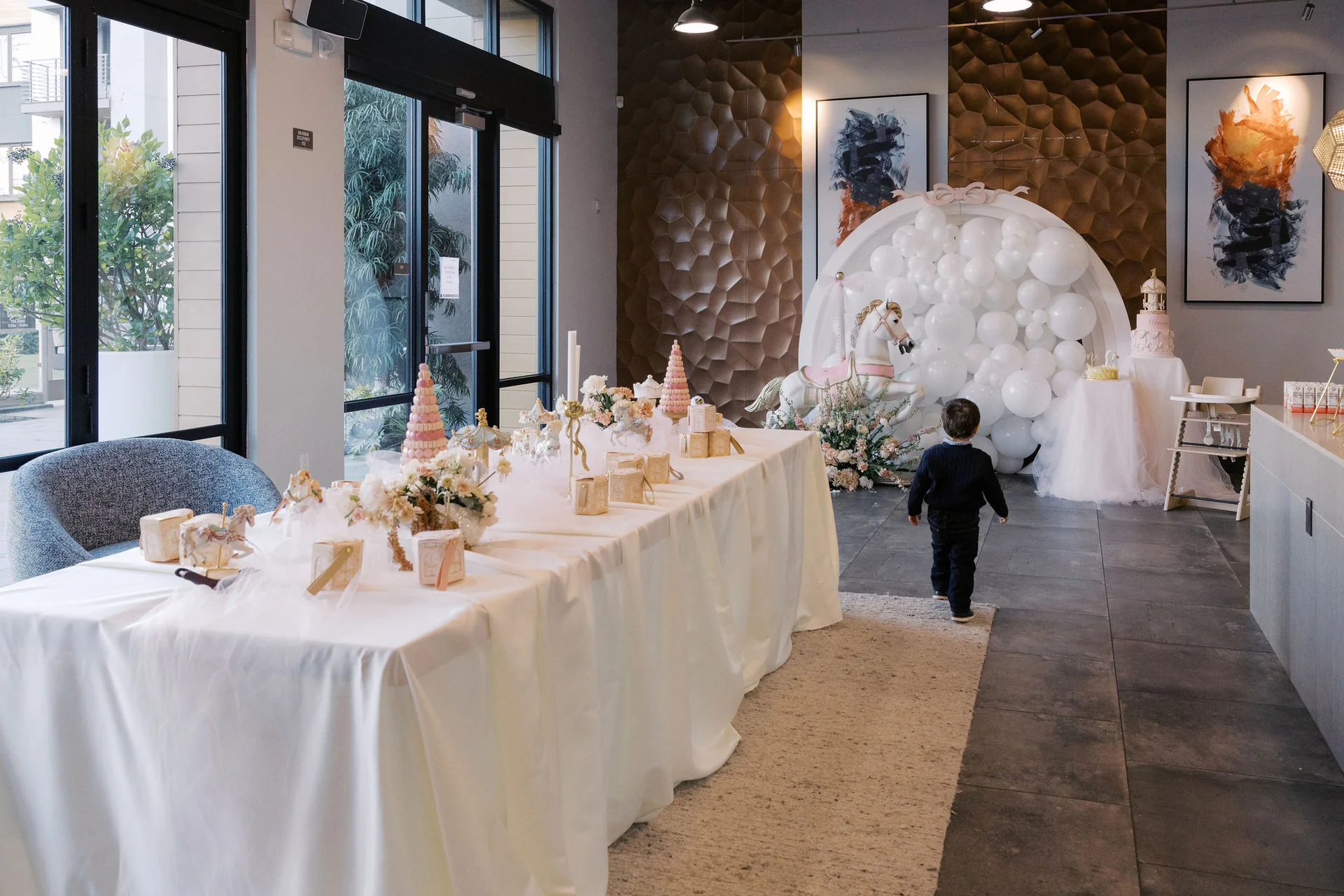 Birthday table arranged for guests at Eléonore First Birthday