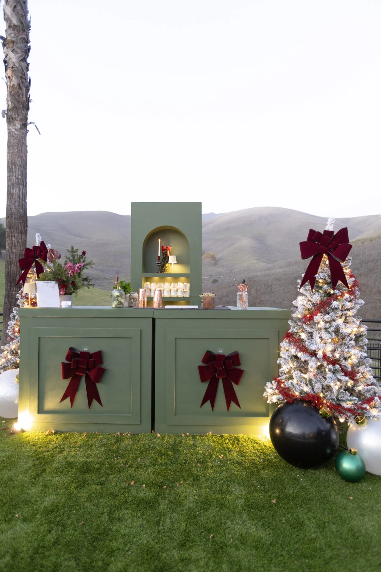 Holiday trees and gift display at M&E Company Holiday Party