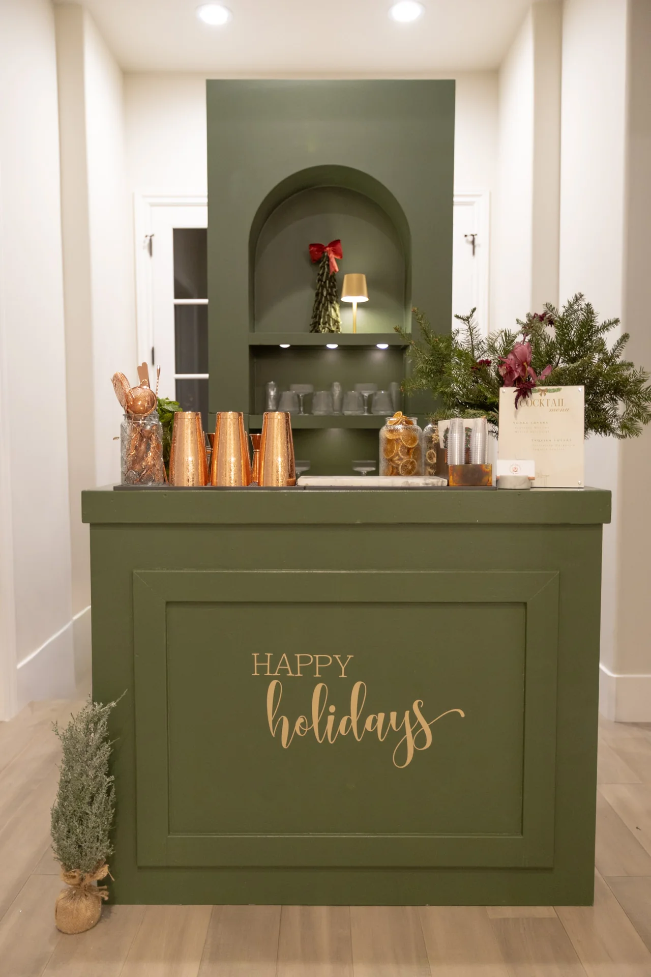 Custom holiday bar and bottles at M&E Company Holiday Party