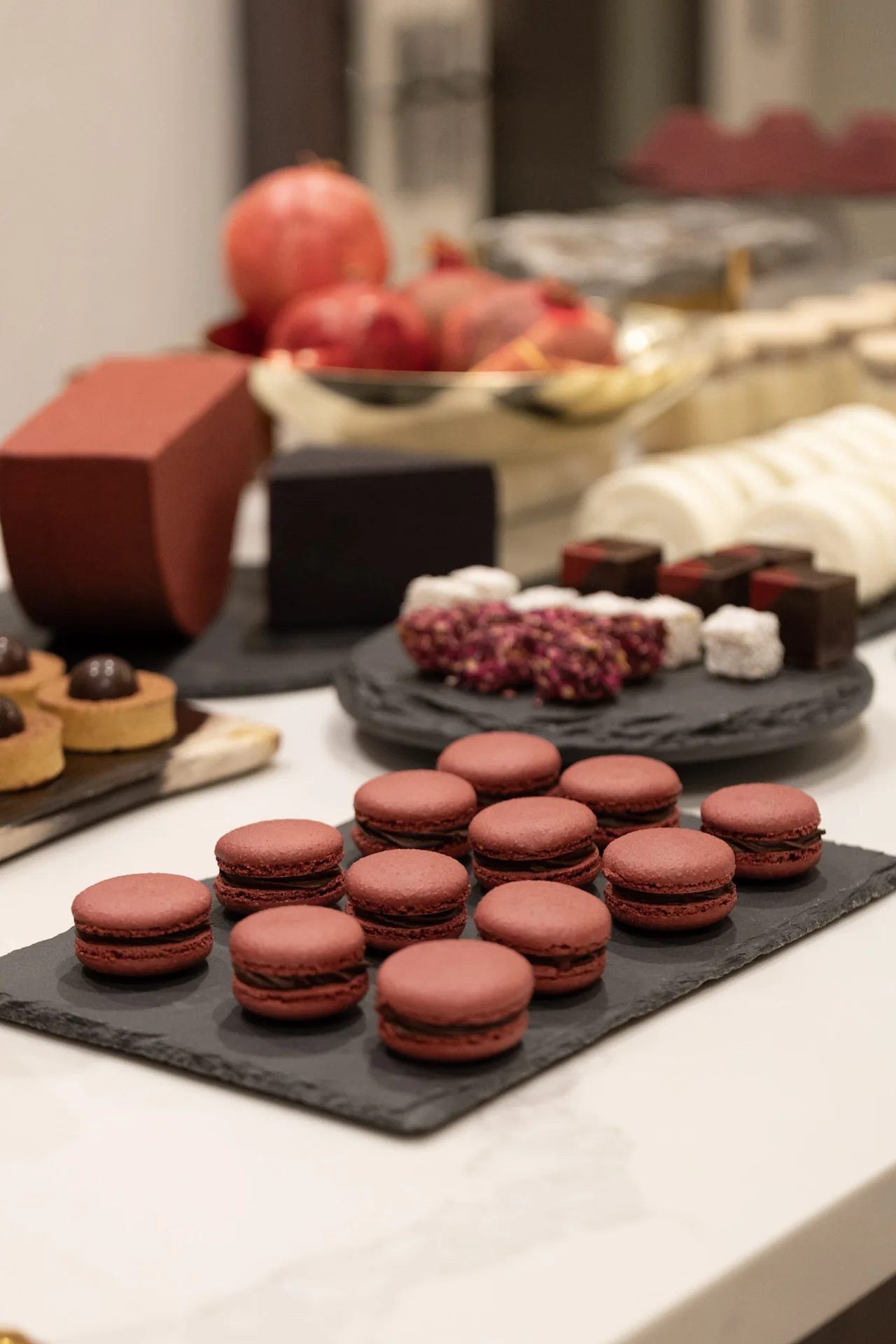 Dessert table with macarons at M&E Company Holiday Party